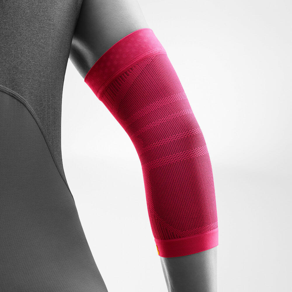 Vista sul retro delle Sportsleeves rosa per il gomito